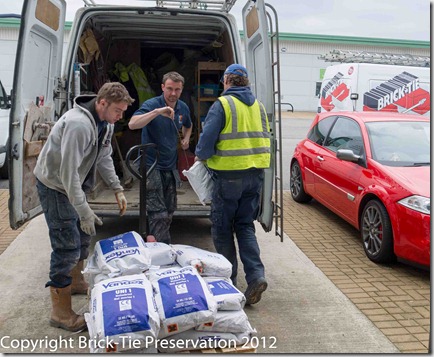 Vandex waterproofing materials being loaded for a job in Cheshire