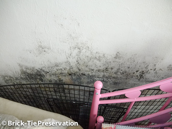Mould behind furnishings due to high humidity